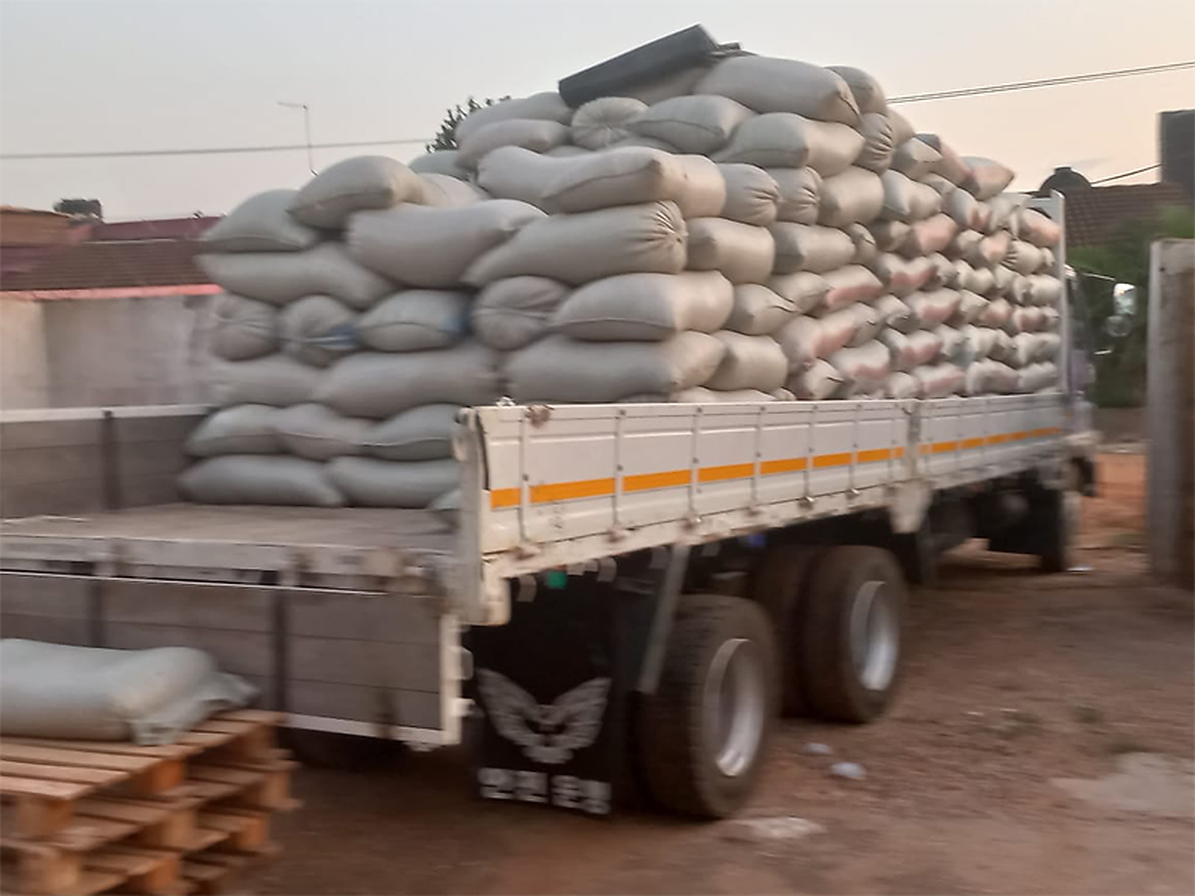 Grain being transferred into a bulk trailer at harvest